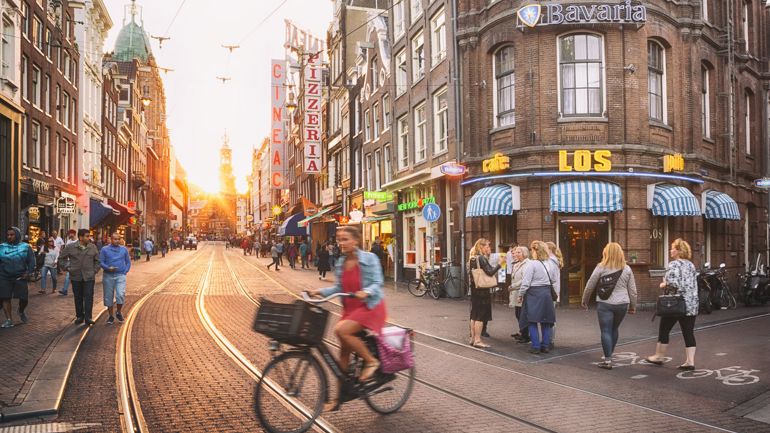 Woman on a bicycle in a city street