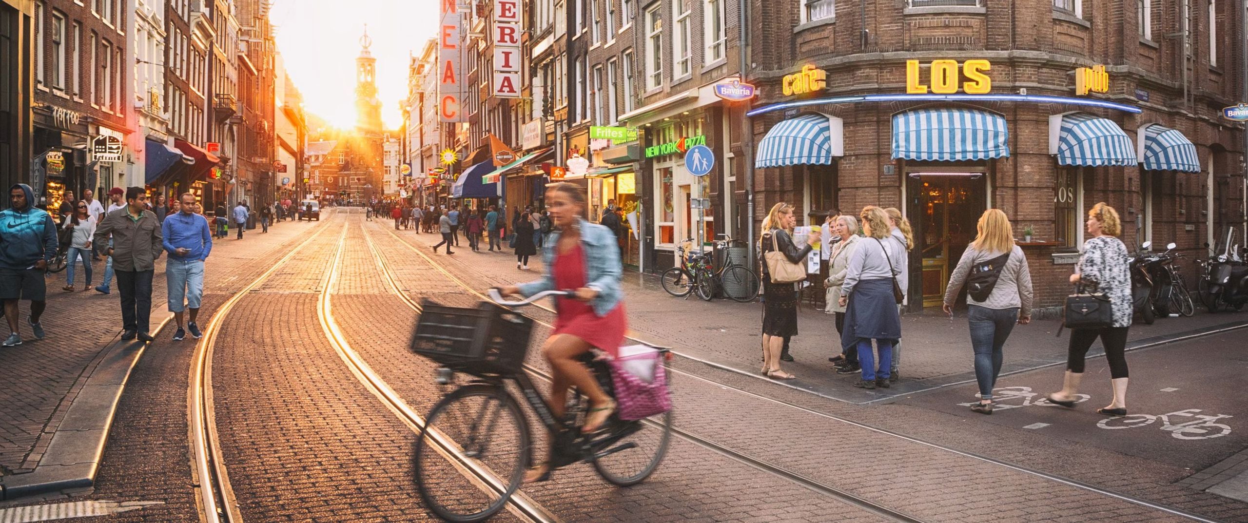 Woman on a bicycle in a city street